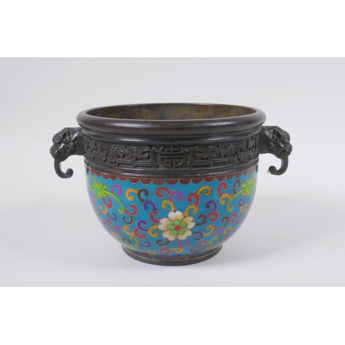 168 - A Chinese bronze censer with two dragon mask handles and cloisonne lotus flower decoration, impresse... 