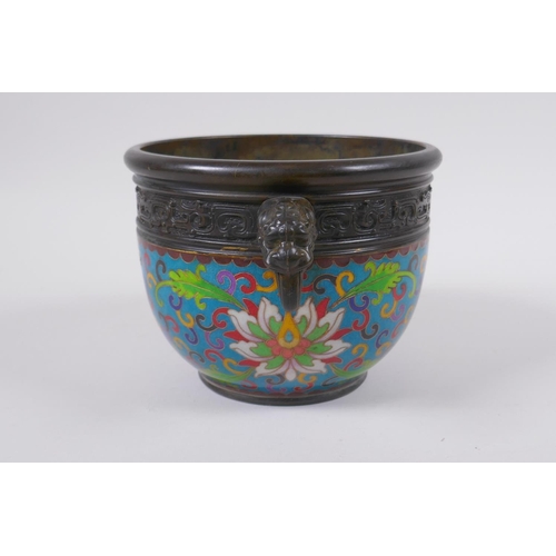 168 - A Chinese bronze censer with two dragon mask handles and cloisonne lotus flower decoration, impresse... 