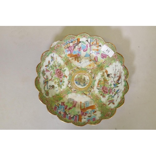 23 - A C19th Cantonese famille verte bowl with shaped rim, AF, 26cm diameter