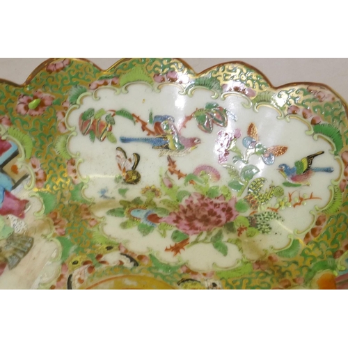 23 - A C19th Cantonese famille verte bowl with shaped rim, AF, 26cm diameter