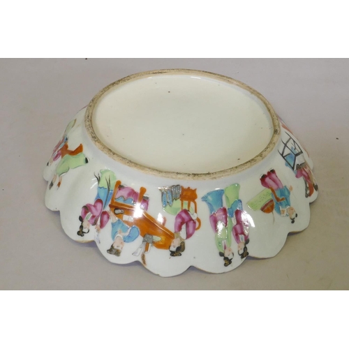 23 - A C19th Cantonese famille verte bowl with shaped rim, AF, 26cm diameter