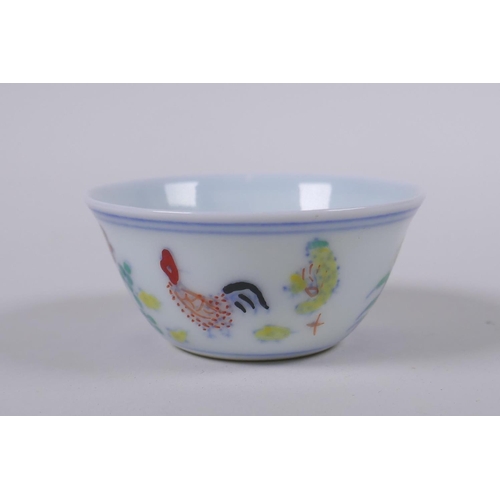 33 - A Doucai porcelain tea bowl with chicken decoration, Chinese Chenghua 6 character mark to base, 6cm ... 