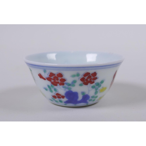 33 - A Doucai porcelain tea bowl with chicken decoration, Chinese Chenghua 6 character mark to base, 6cm ... 