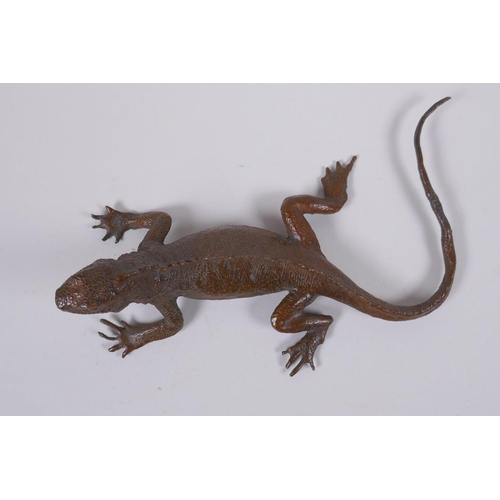 40 - A Japanese style bronze okimono lizard, impressed mark to the base, 15cm long