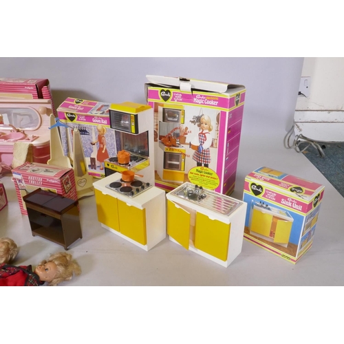 42 - A large collection of vintage pedigree Sindy dolls and accessories, including two 1981/82 Sindy doll... 