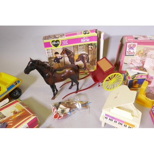 42 - A large collection of vintage pedigree Sindy dolls and accessories, including two 1981/82 Sindy doll... 