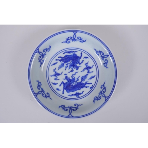 43 - A blue and white porcelain dish with twin kylin decoration, Chinese Chenghua 6 character mark to bas... 