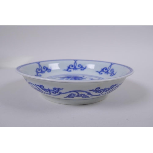 43 - A blue and white porcelain dish with twin kylin decoration, Chinese Chenghua 6 character mark to bas... 