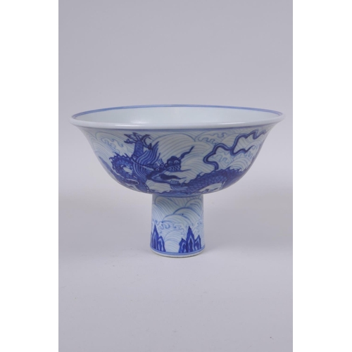 48 - A Chinese blue and white porcelain stem bowl decorated with dragons, Xuande 6 character mark to bowl... 