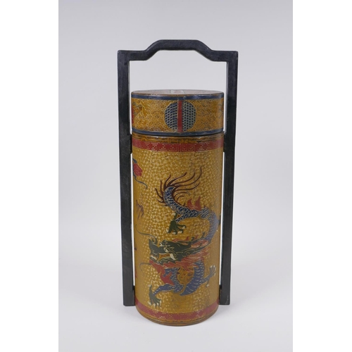 50 - A Chinese gilt lacquered cylinder container with chased and painted dragon decoration, the cover wit... 