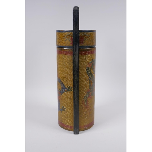 50 - A Chinese gilt lacquered cylinder container with chased and painted dragon decoration, the cover wit... 