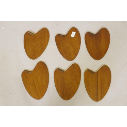 57 - A set of six mid century Danish rosewood veneered coasters marked PV Vamo, 24cm long