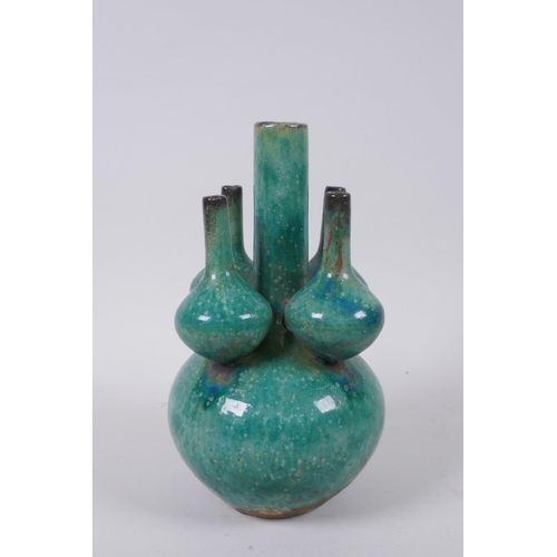 83 - A Chinese green crackle glazed porcelain tulip vase, 22cm high