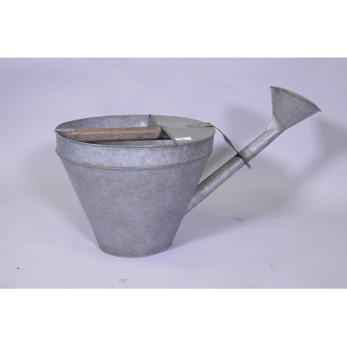 86 - A vintage galvanised watering can, 39cm high