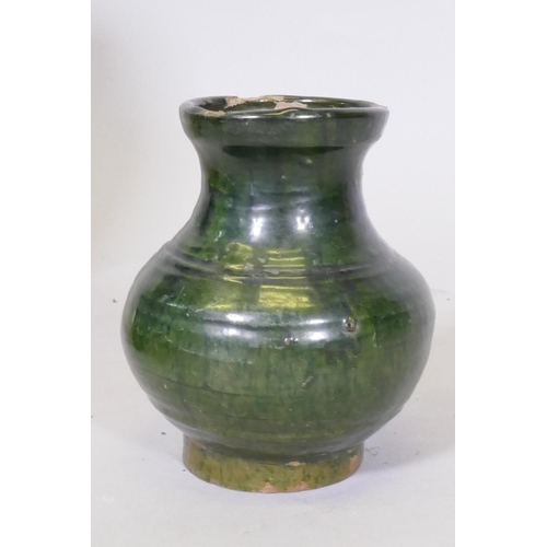 87 - A studio pottery pot with two handles and blue glaze, 23cm high, a green glazed pot, terracotta pot ... 