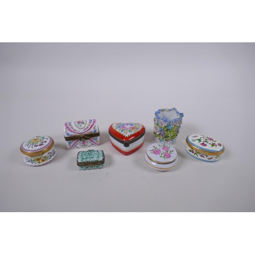 92 - Four Limoges hand painted porcelain trinket/pill boxes with floral decoration, and two Halcyon Days ... 