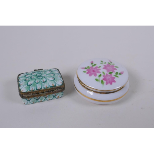 92 - Four Limoges hand painted porcelain trinket/pill boxes with floral decoration, and two Halcyon Days ... 