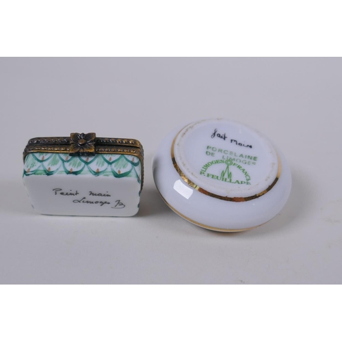 92 - Four Limoges hand painted porcelain trinket/pill boxes with floral decoration, and two Halcyon Days ... 