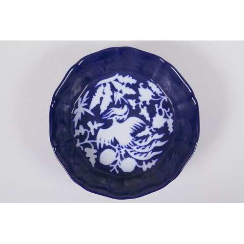 93 - A Chinese blue and white porcelain steep sided dish of lobed form with phoenix and floral decoration... 