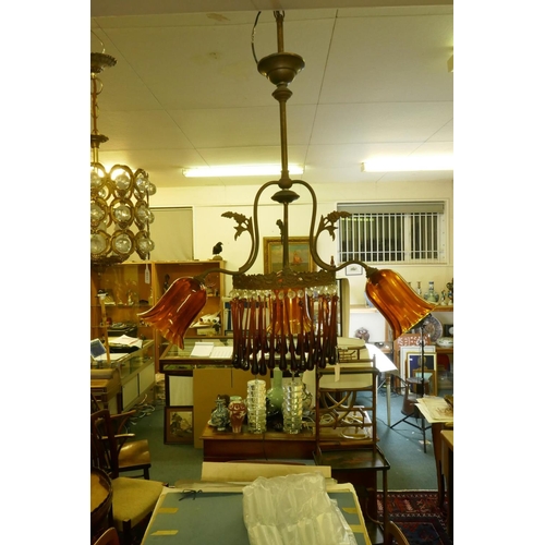 1129 - An early C19th continental pendant ceiling light with three branches and amber glass drops and shade... 