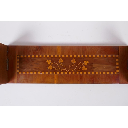 1 - A C19th Irish Kilarney satinwood inlaid yew wood book slide, decorated with harps and clover