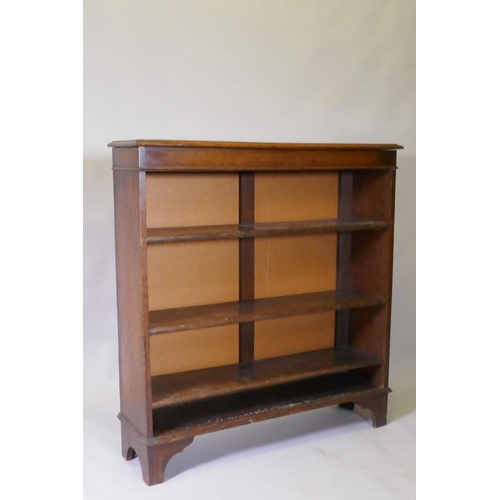 1011 - An Edwardian oak open bookcase with three adjustable shelves, back-boards replaced, 108 x 29 x 114cm