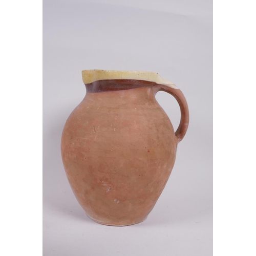 102 - A mid century Denby Glyn College earthenware jug, two Silchester treacle glazed terracotta vases, an... 