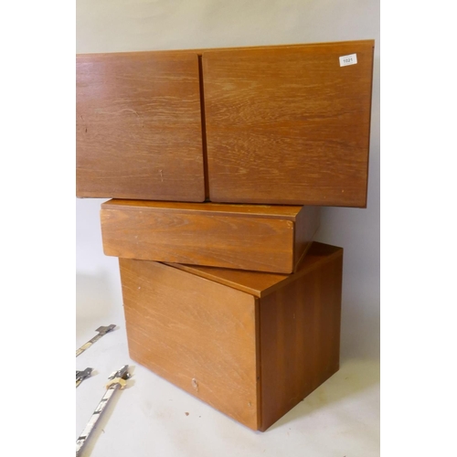 1021 - A mid century teak Tapley 33 wall system, by Beaver & Tapley, designed by Peter Weston, comprisi... 