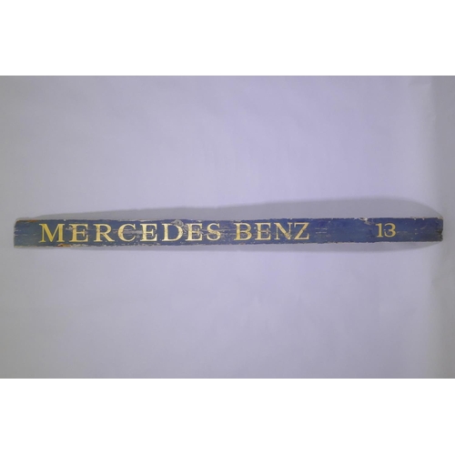 1023 - A vintage painted and gold leafed pine Mercedes Benz sign, 200 x 12cm