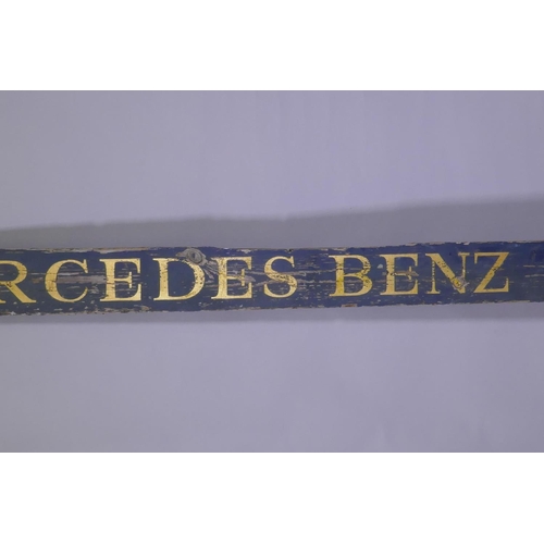 1023 - A vintage painted and gold leafed pine Mercedes Benz sign, 200 x 12cm