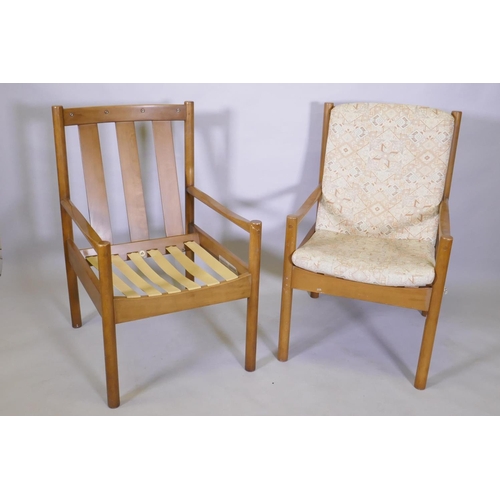 1026 - A pair of Ercol beech and wood open armchairs