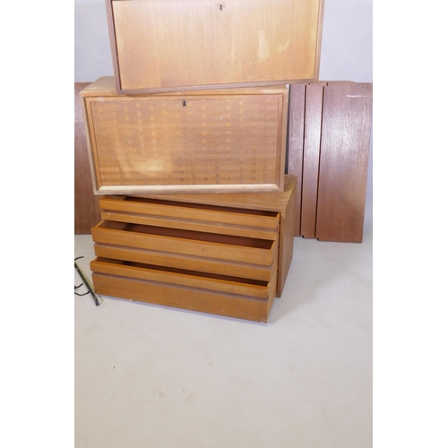 1029 - A mid century Danish teak System Cado/Royal System by Poul Cadovius, comprising three units, five sh... 