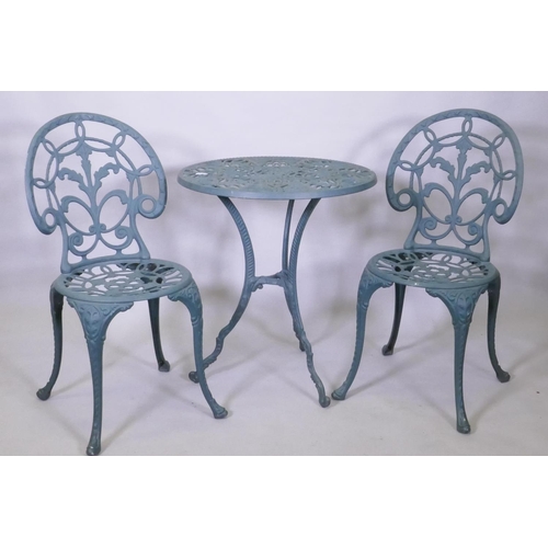 1037 - A painted metal garden table and two chairs, 60 cm diameter