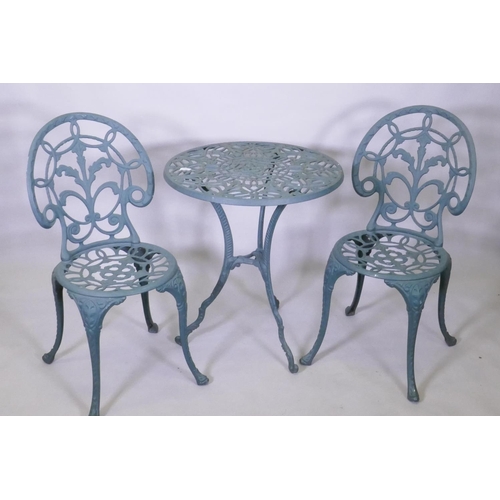 1037 - A painted metal garden table and two chairs, 60 cm diameter