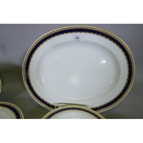 104 - A Royal Crown Derby part dinner service, and Johnson Bros 'Pareek' plates and side plates