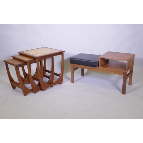 1041 - A nest of three G Plan Astro tile top teak tables, 50 x 50 x 50cm, and a mid century telephone table... 