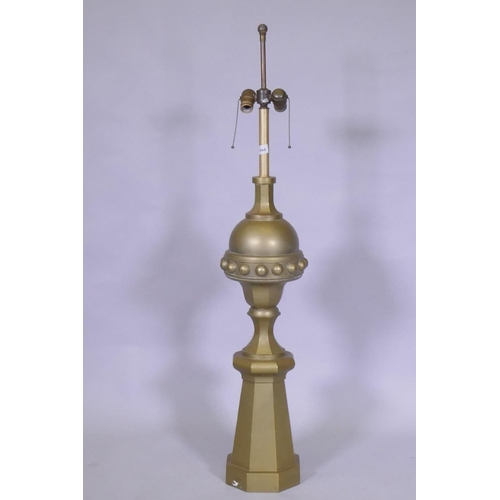 1049 - A brass lamp in the form of an architectural finial, 119cm high