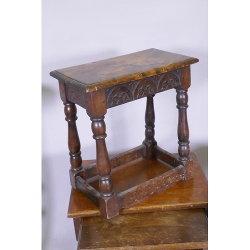 1053 - An Arts & Crafts oak dish top jardiniere stand (reduced), a joynt stool with elm top, nest of th... 