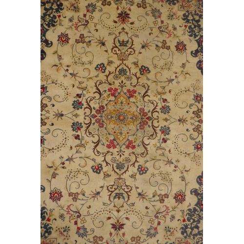 1061 - A cream ground Kashan carpet with Royal design, 200 x 290cm