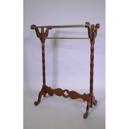 1064 - A mahogany and brass towel rail, 70 x 46 x 106cm