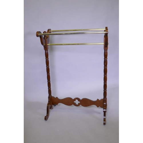 1064 - A mahogany and brass towel rail, 70 x 46 x 106cm