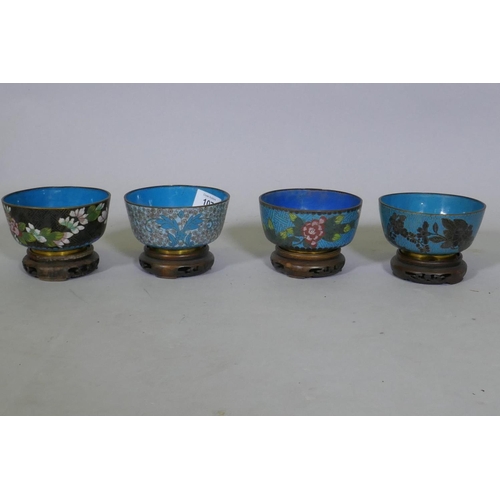 107 - Four Chinese cloisonne enamel bowls on wood stands, late C19th/early C20th