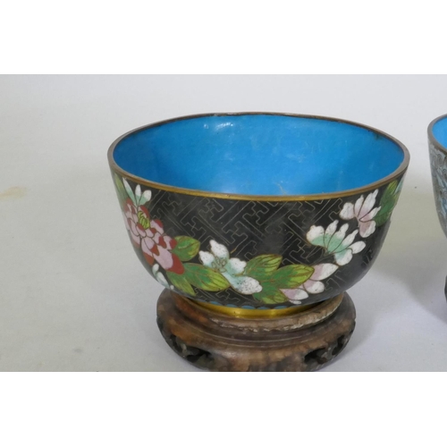 107 - Four Chinese cloisonne enamel bowls on wood stands, late C19th/early C20th