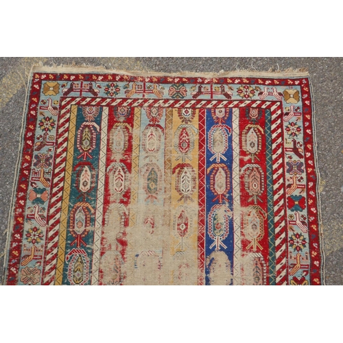 1071 - An antique multicolour Caucasian Shirvan runner, worn, 125 x 284cm