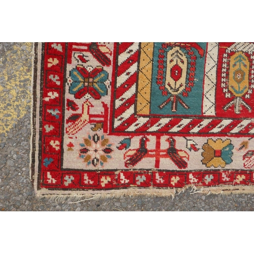 1071 - An antique multicolour Caucasian Shirvan runner, worn, 125 x 284cm