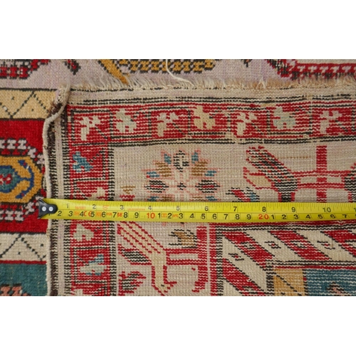 1071 - An antique multicolour Caucasian Shirvan runner, worn, 125 x 284cm