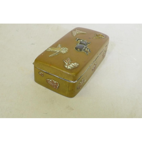 108 - A Japanese Meiji period brass stamp box with raised multi-metal decoration of beetles, dragonfly and... 