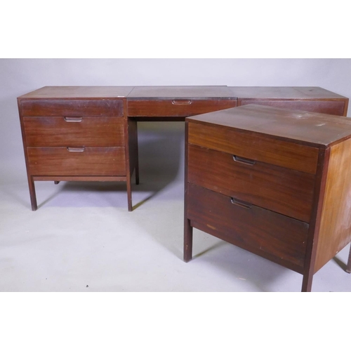 1083 - A mid century teak dressing table, comprising two end sections and removable centre section with fol... 