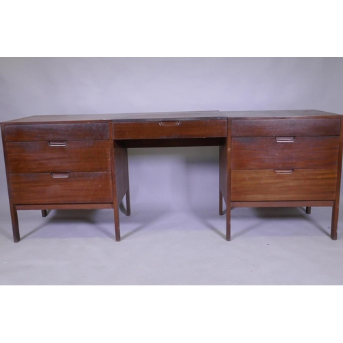 1083 - A mid century teak dressing table, comprising two end sections and removable centre section with fol... 