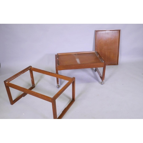 1087 - A mid century White & Newton teak two tier trolley in two sections with removable galleried tray... 